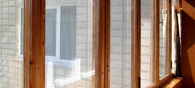 Достоинства и недостатки остекления балконов и лоджий деревянными рамами
